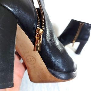 MK black leather booties